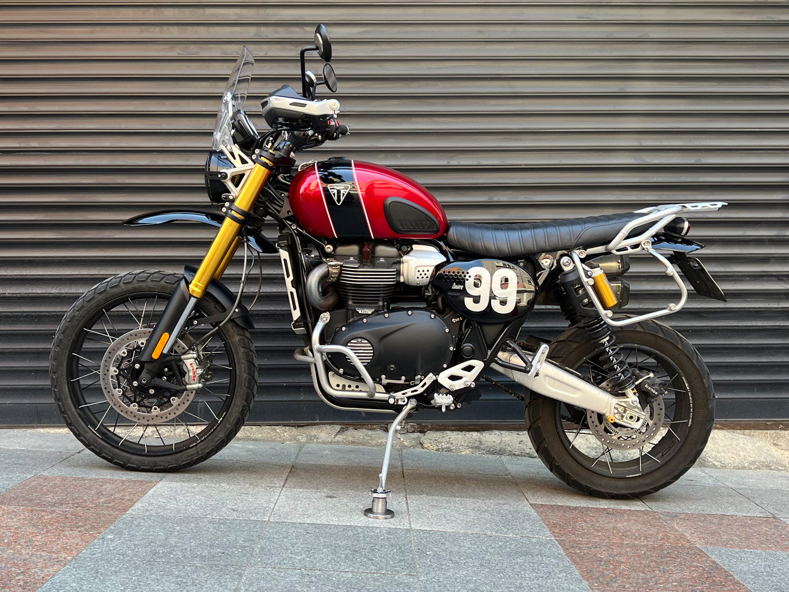 Triumph 1200 XE XC X PA12 High Fender Mainimage Glossy Black Wide Shot Side View