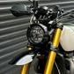 Triumph 1200 XE XC X Headlight Grill Protection Guard mounted on motorcycle
