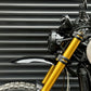 Triumph 1200 XE XC X Headlight Grill Protection Guard mounted on motorcycle side view