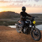 Triumph Radiator Guard Black engine guard Person on a motorcycle at sunset with a scenic background